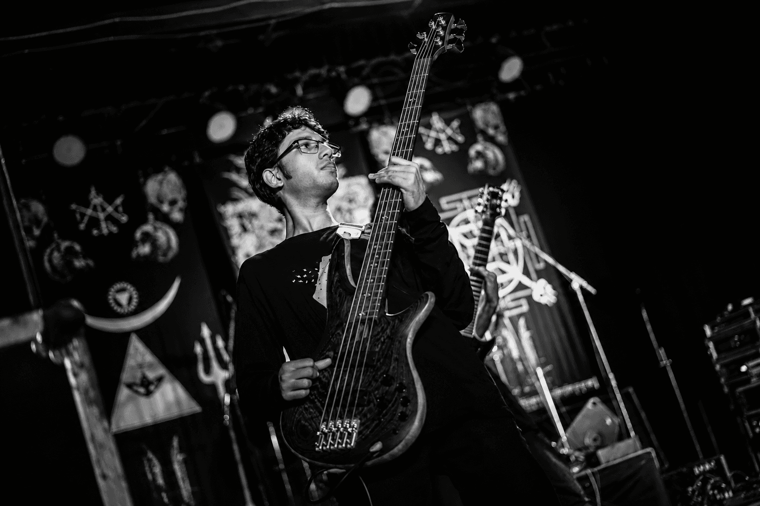 Anurag Chowdhury performing bass for Disquietude Vengeance.